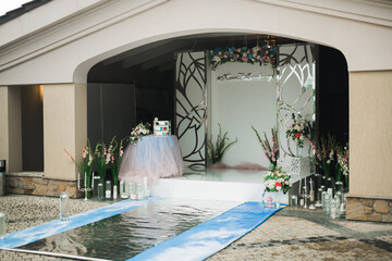 Obraz na płótnie Canvas Interior of a restaurant prepared for wedding ceremony