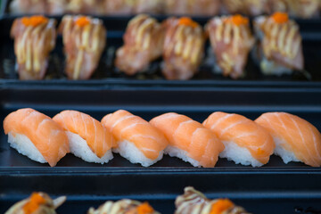 Japanese sushi Maki and rolls show food background