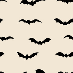 Black silhouettes of bats seamless pattern  on color background.  Halloween design for baby clothes, bedding, textiles, print, wallpaper.