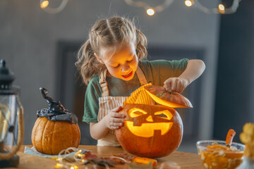 girl with carving pumpkin