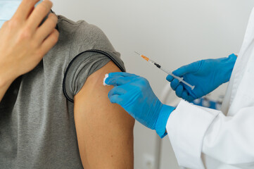 Crop doctor preparing patient for vaccination