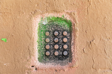 old intercom smeared in paint