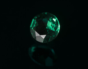 gemstones emeralds isolated on black background