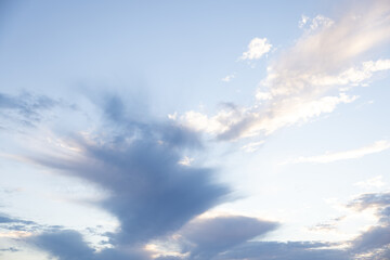 Obraz premium Amazing clouds hanging in the blue sky. Wonderful sunset and a better sunrise with beautiful clouds with a colorful sky.