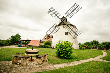 Old, wooden windmill from XIX century in a rural scenery south moravia, czech republic
