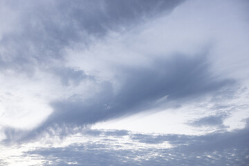 Fototapeta premium Amazing clouds hanging in the blue sky. Wonderful sunset and a better sunrise with beautiful clouds with a colorful sky.