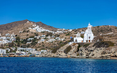 Agia Eirini Orthodox Church build on rocky hill at Ios Nios island Chora Cyclade Greece.
