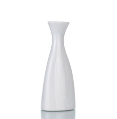 One white ceramic decorative flower vase, close-up, isolated on white.