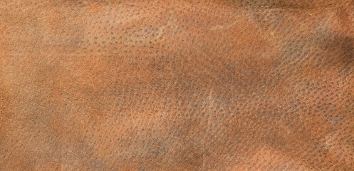 old scratched worn orange leather background and texture