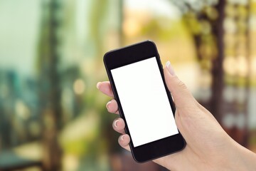 Human holding a modern phone with a blank screen