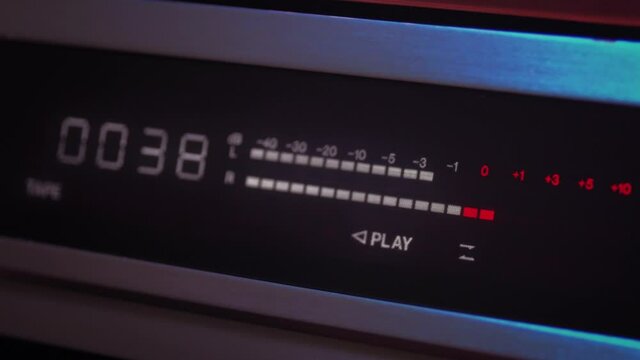 Music player, led meters display close up. A vintage music template with a retro color look