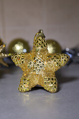 golden star christmas toy close-up. new year's decor
