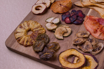 Dried fruits, pineapple, kiwi, melon, watermelon, banana, strawberry, plum, apple, persimmon. Dehydrated. Frips. Vegan food. Organic natural products.