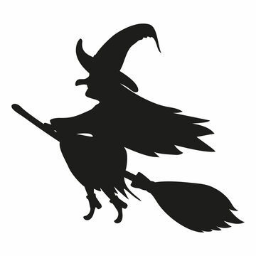 Silhouette of a witch flying on a broomstick. 