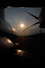 Aircraft propeller. Outside view. Sunset and plane. High quality photo