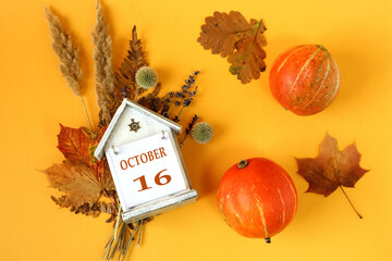Calendar for October 16 : decorative house with the name of the month in English and the number 16...