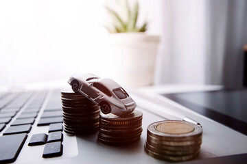businessman holding coins putting in glass and using calculator. concept saving money and finance accounting.