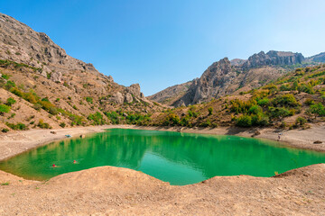 Amazing emerald mountain lake among the forest, Crimea