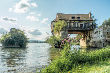 The old mill on the medieval bridge at Vernon, Normandy, france - obrazy, fototapety, plakaty