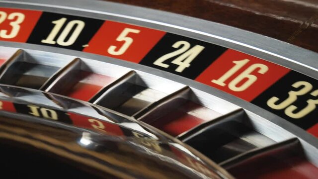rotating casino roulette wheel. close-up. gambling.