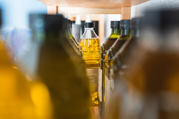 Olive oil bottles on rack at store