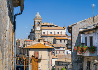 italian city Gradoli with old architecture in summer day under blue sky
