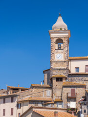 view to single clock's tower under blue sky with copy space in italian city