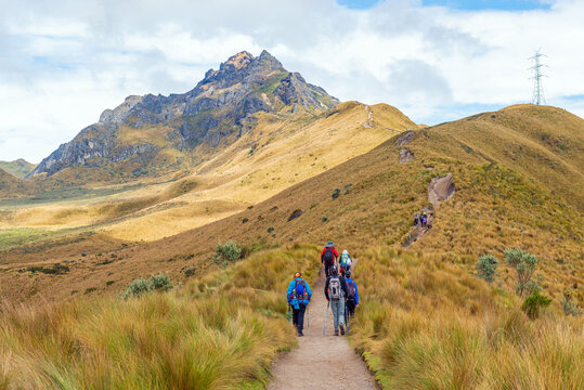 Small Group Of People With Backpack Hiking The Rucu Pichincha Hike To The 4696m High Andes Peak, Pichincha Volcano, Quito, Ecuador.
