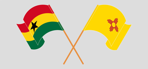 Crossed and waving flags of Ghana and the State of New Mexico