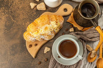 Coffee and croissant, good morning and breakfast concept