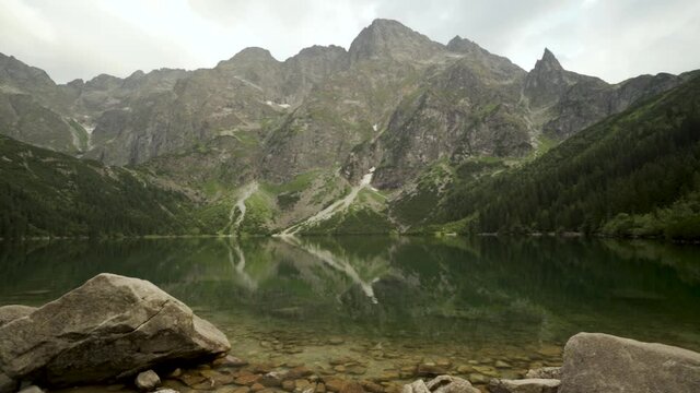 Pan shot of Polish Tatra mountains Morskie Oko lake with crystal water located in Zakopane, South Poland, Europe