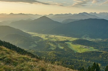 Fototapeta na wymiar Scenic sunrise above a beautiful mountain range. Moutain range during sunrise.
