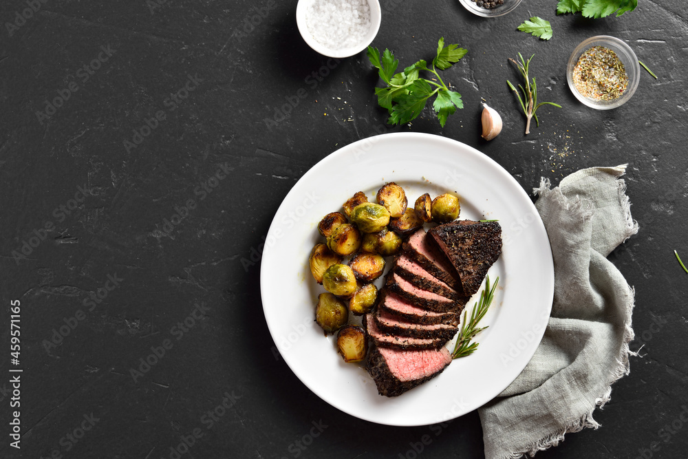 Wall mural grilled beef steak with brussels sprouts