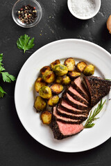 Grilled beef steak with brussels sprouts