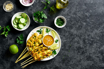 Fototapeta na wymiar Chicken satay with peanut sauce