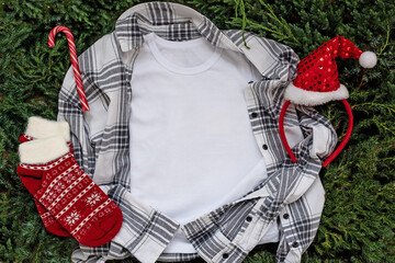Close up white blank template t shirt with copyspace and Christmas Holiday concept. Top view mockup...