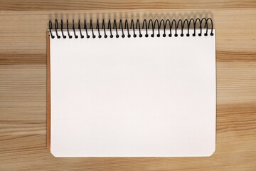 One page of the blank monthly calendar on the desk