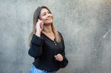 woman talking on cell phone and smiling