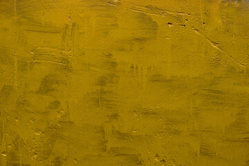 carelessly painted yellow flat surface - texture and full frame background