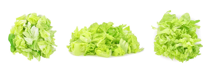 Heap of sliced green lettuce isolated on white background.