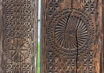 Detail of a old and beautifully carved wooden door