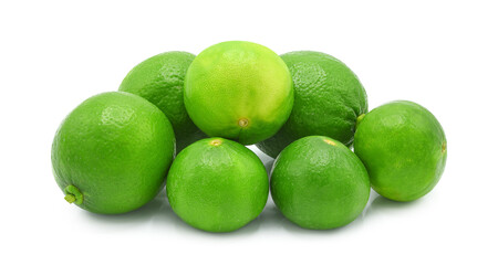 Whole fresh green lime isolated on white background