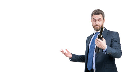 Business man look at wine bottle showing open hands presenting product to choose, choice
