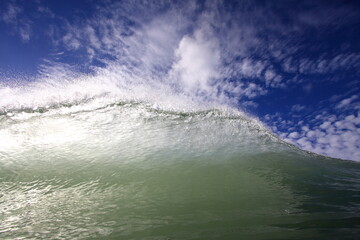 lip of a wave going overhead