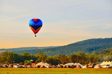 Hot air balloon in flight. Balloon Festival in Dansville, New York, during the Labor Day weekend 2021