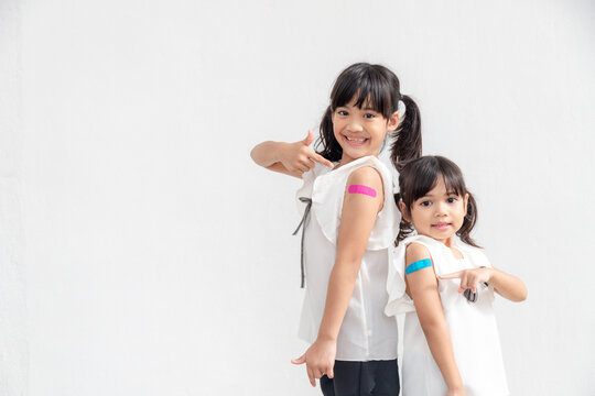 Asian Little Girl  Feel Good After Received A Vaccine.