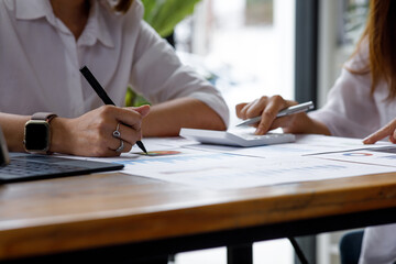 Close u of Team business people working together in the meeting room office, teamwork background charts and graphs banner, double exposure successful teamwork, business planning concept.