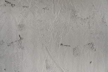 wet cement wall texture in building construction for background