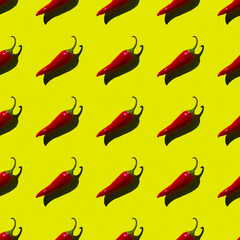 flat seamless pattern of red hot pepper on a yellow background