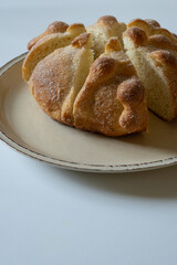 Vertical shot of sliced pan de muerto